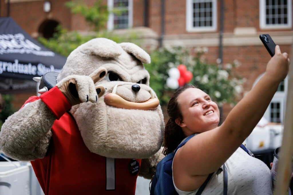 A student with Hairy Dawg