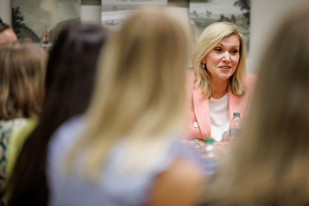 Donna Hyland talks with students before the Mason Leadership Lecture
