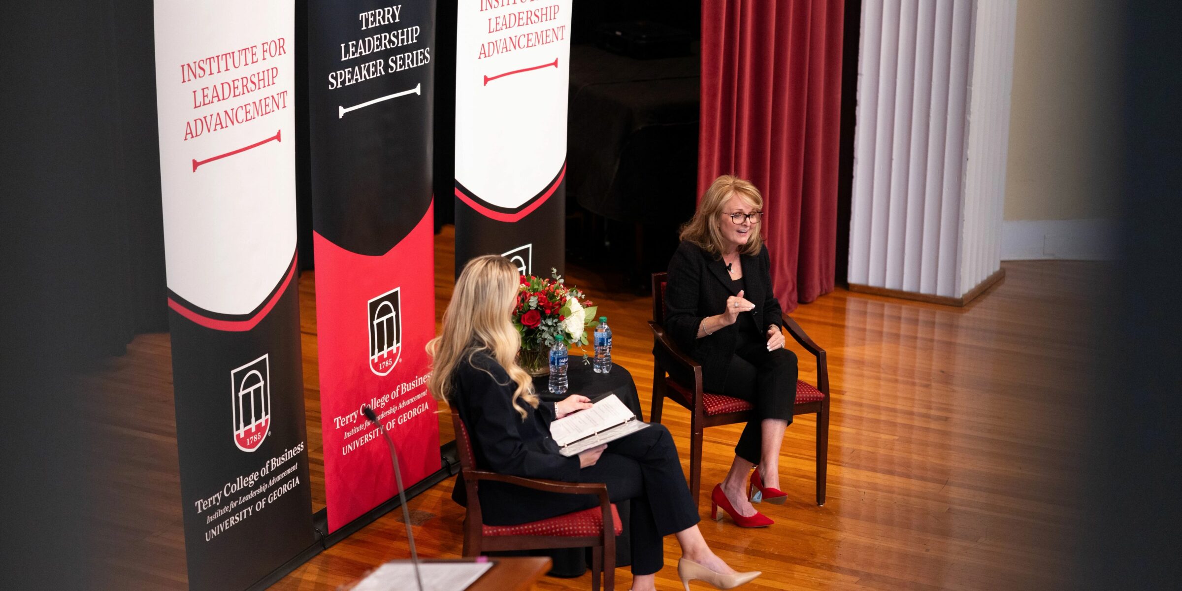 COX Communications COO Colleen Langner on stage at the UGA Chapel