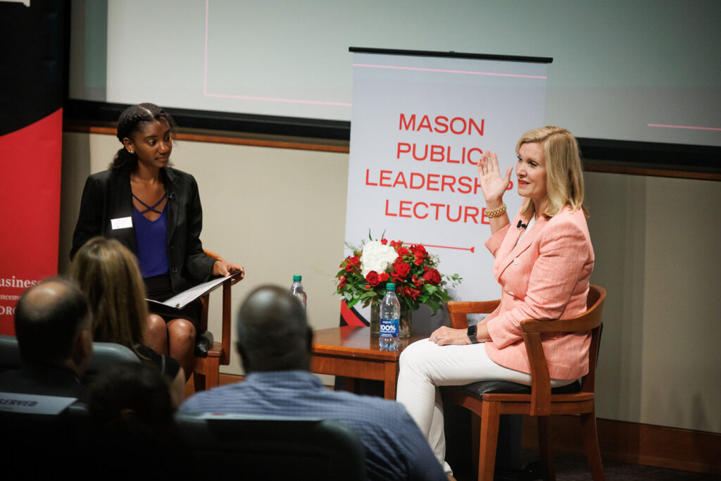 Donna Hyland on stage at the Richard B. Russell Building Special Collections Libraries as part of the Mason Public Leadership Lecture