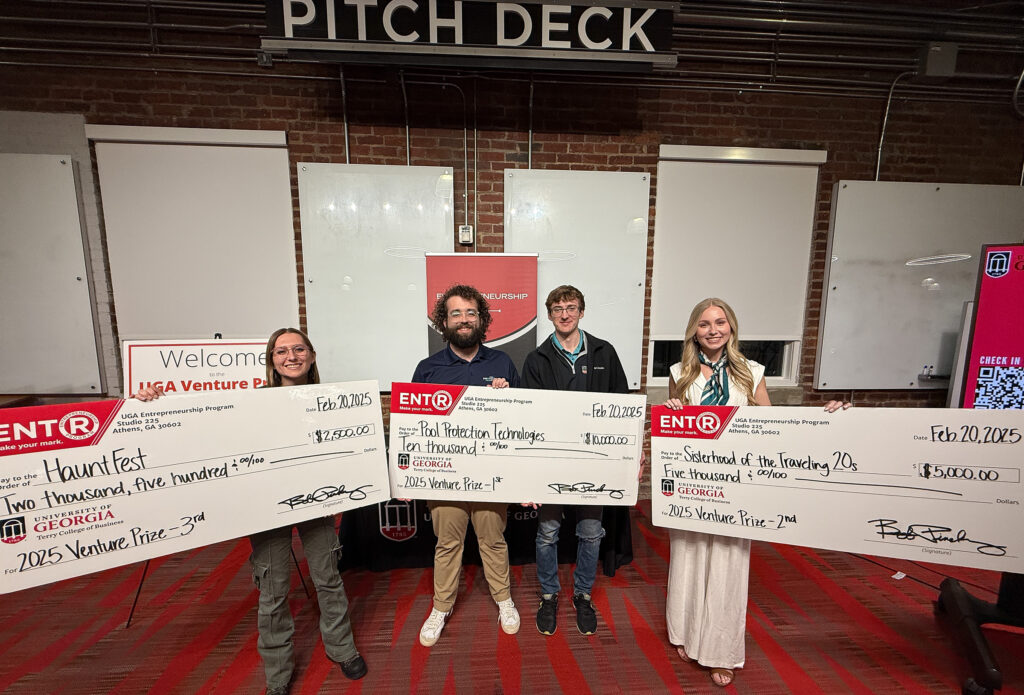 Winners of the 2025 UGA Venture Prize stand with their prize checks at the Truist Pitch Deck at Studio 225.