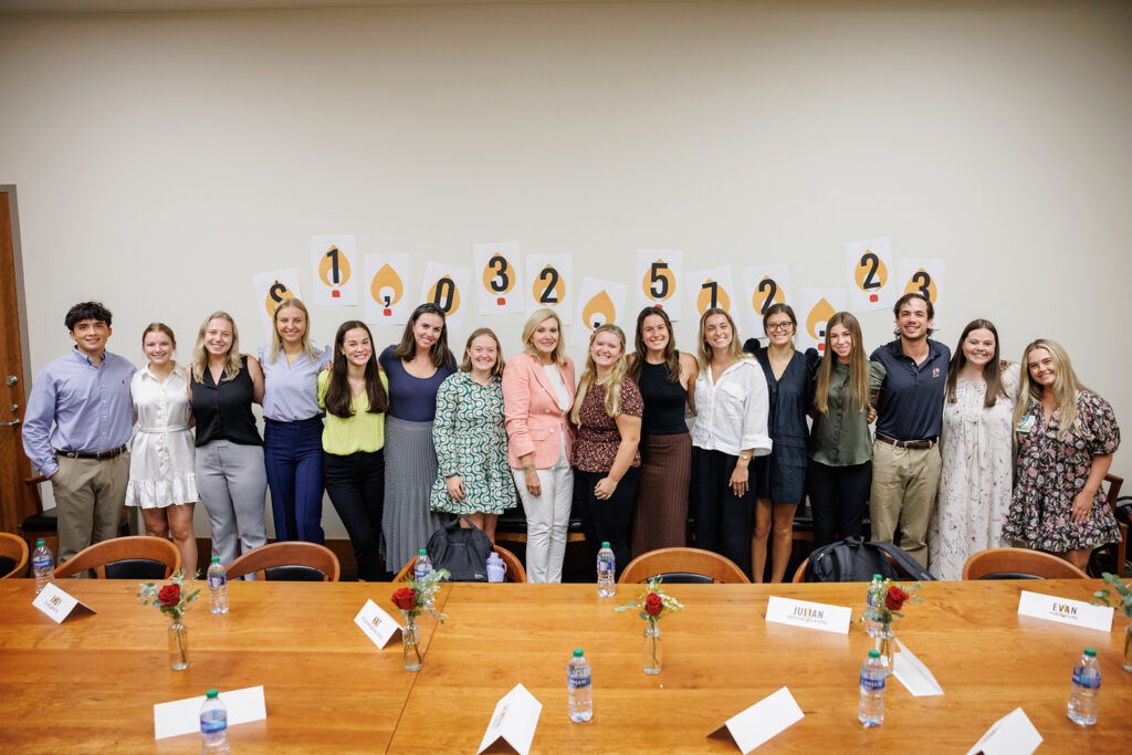Donna Hyland poses with a panel of UGA students before the 2023 Mason Leadership Lecture
