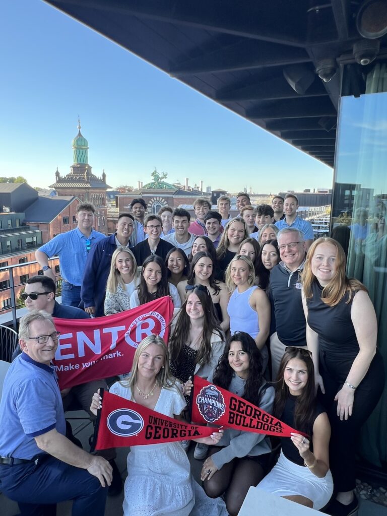 ScandiTripCityScape UGA students pose in front a sky line during one of the first nights of study abroad trip to Northern Europe.