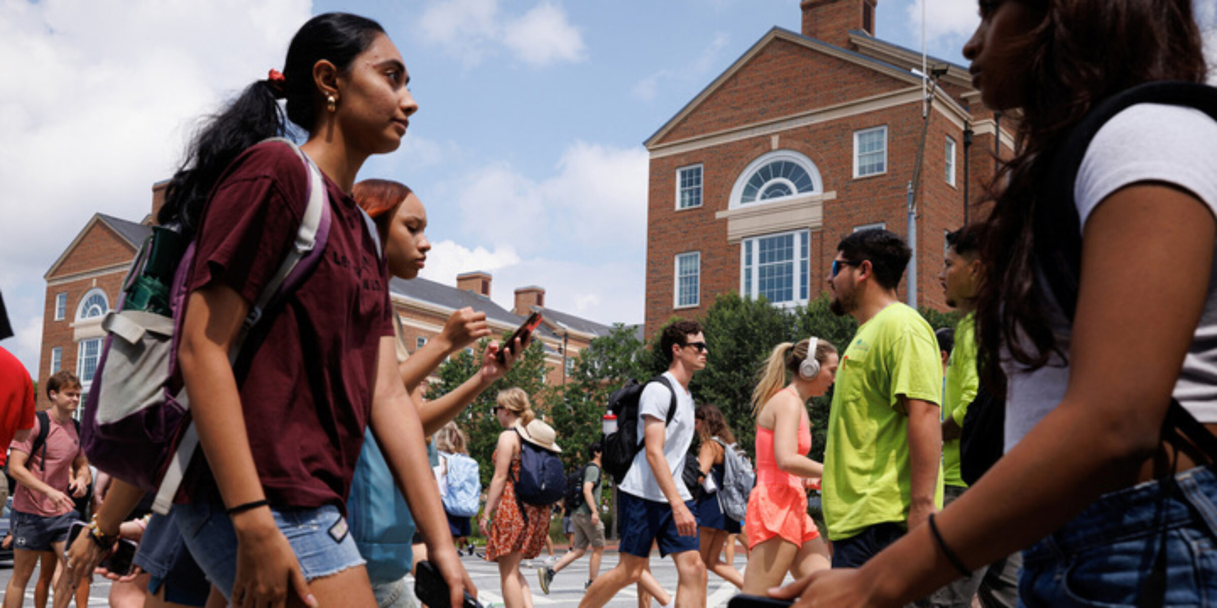 Students cross a busy crosswalk a the University of Georgia on the first day of classes.